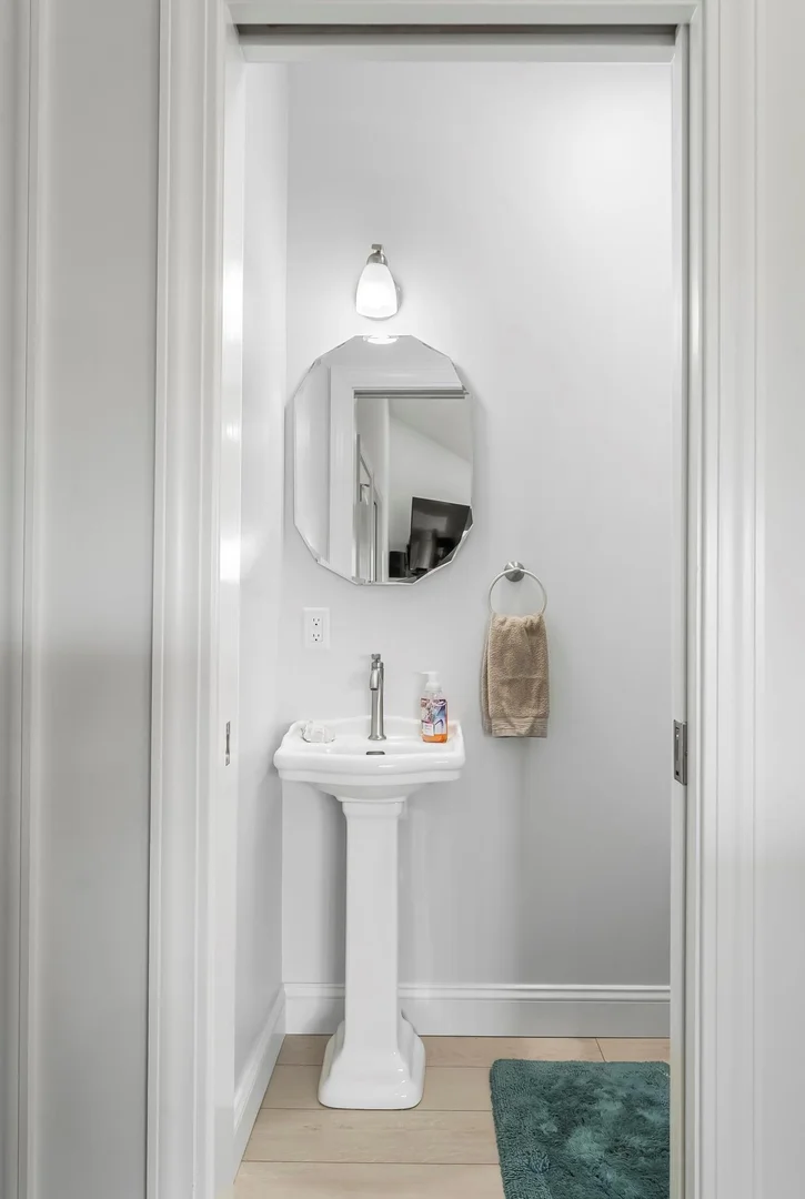 Bathroom half bath sink and mirror